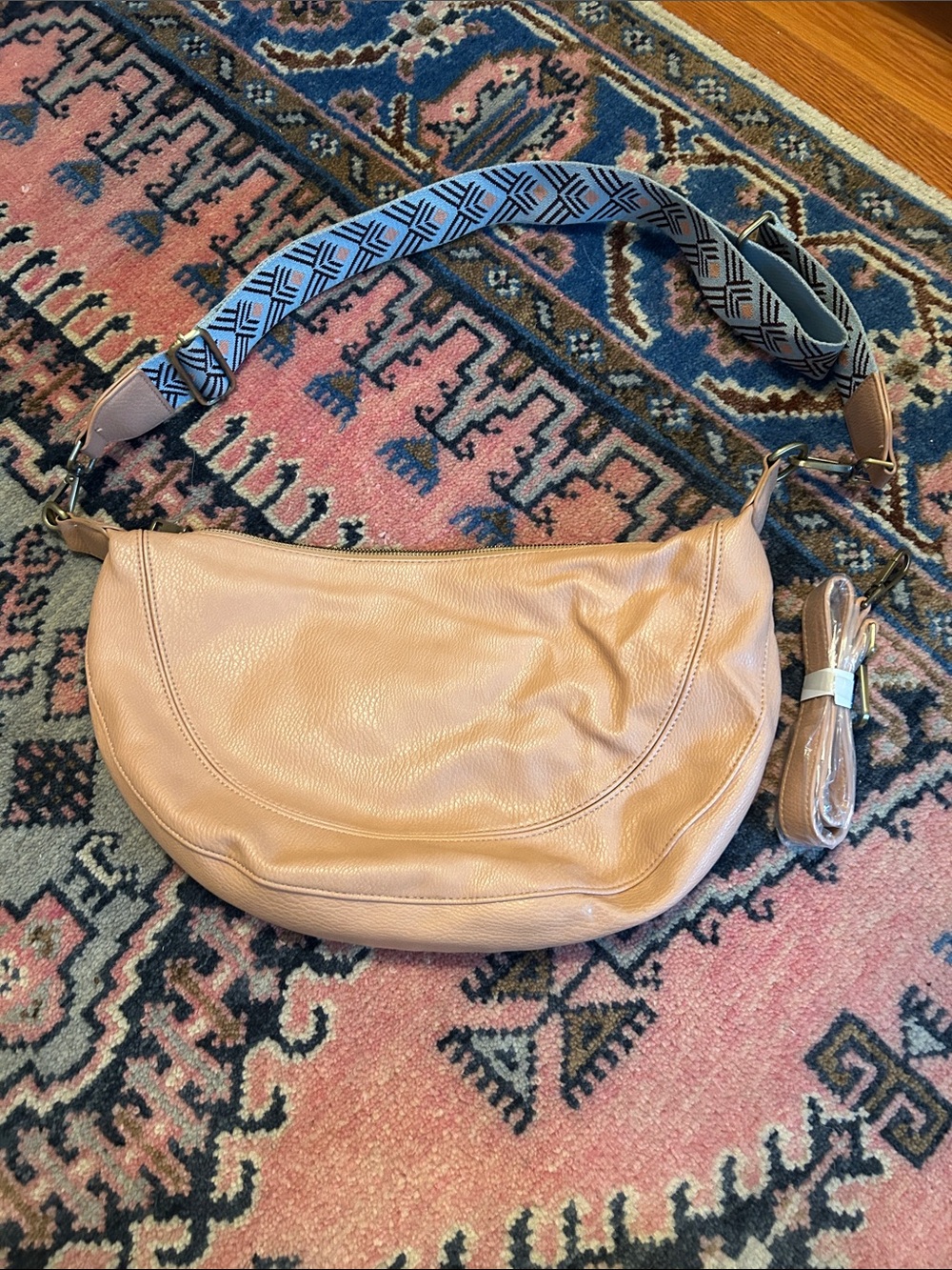 Anthropologie Soft Pink Faux Leather Crescent Shoulder Bag with Decorative Strap